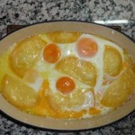 Яйца в сметанном соусе
